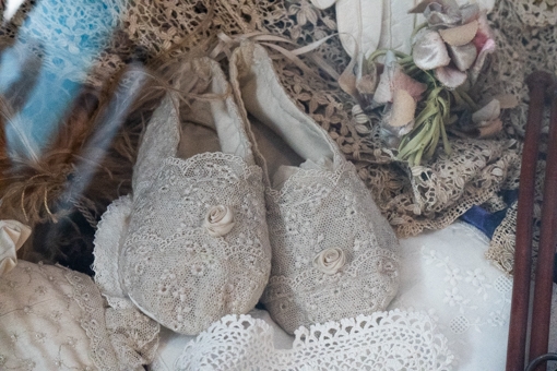 Dainty lace slippers at Blists Hill haberdashers